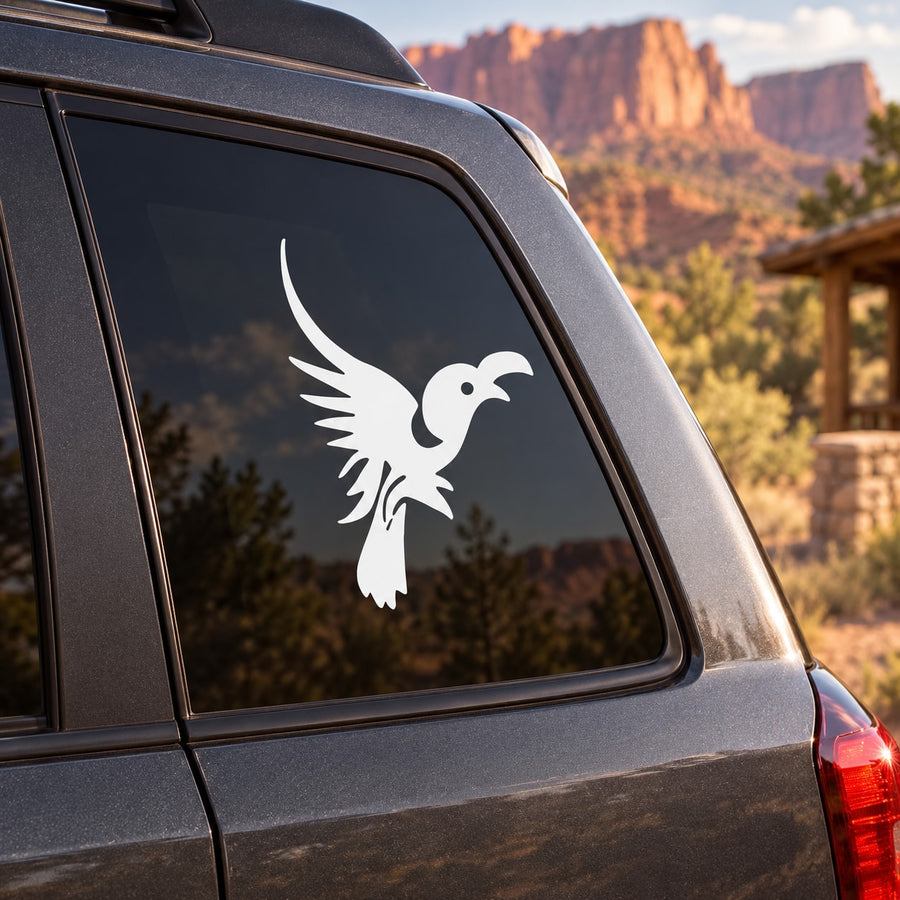 Baby vulture decal with white bird silhouette on a car window