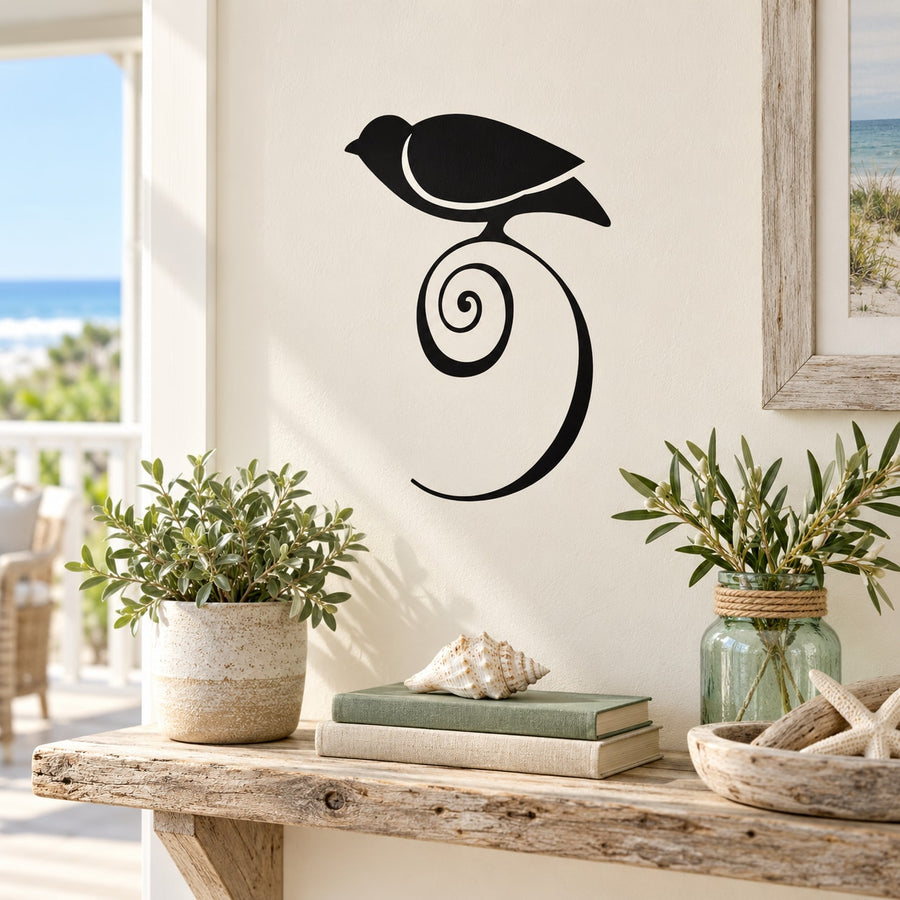 Black bird perched on swirl leaf wall decal, vinyl-style outline design.