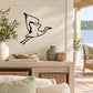 Graceful flapping swan wall decal with black outline silhouette