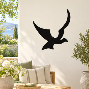 Black bird silhouette wall decal with wings spread, curved tail shape