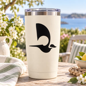 Futuristic bird decal with black abstract bird graphic on a white tumbler