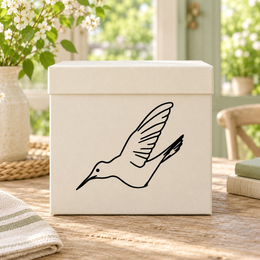 Hummingbird decal with black outline hummingbird on light box