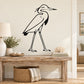 Black line-art walking egret wall decal, single bird silhouette