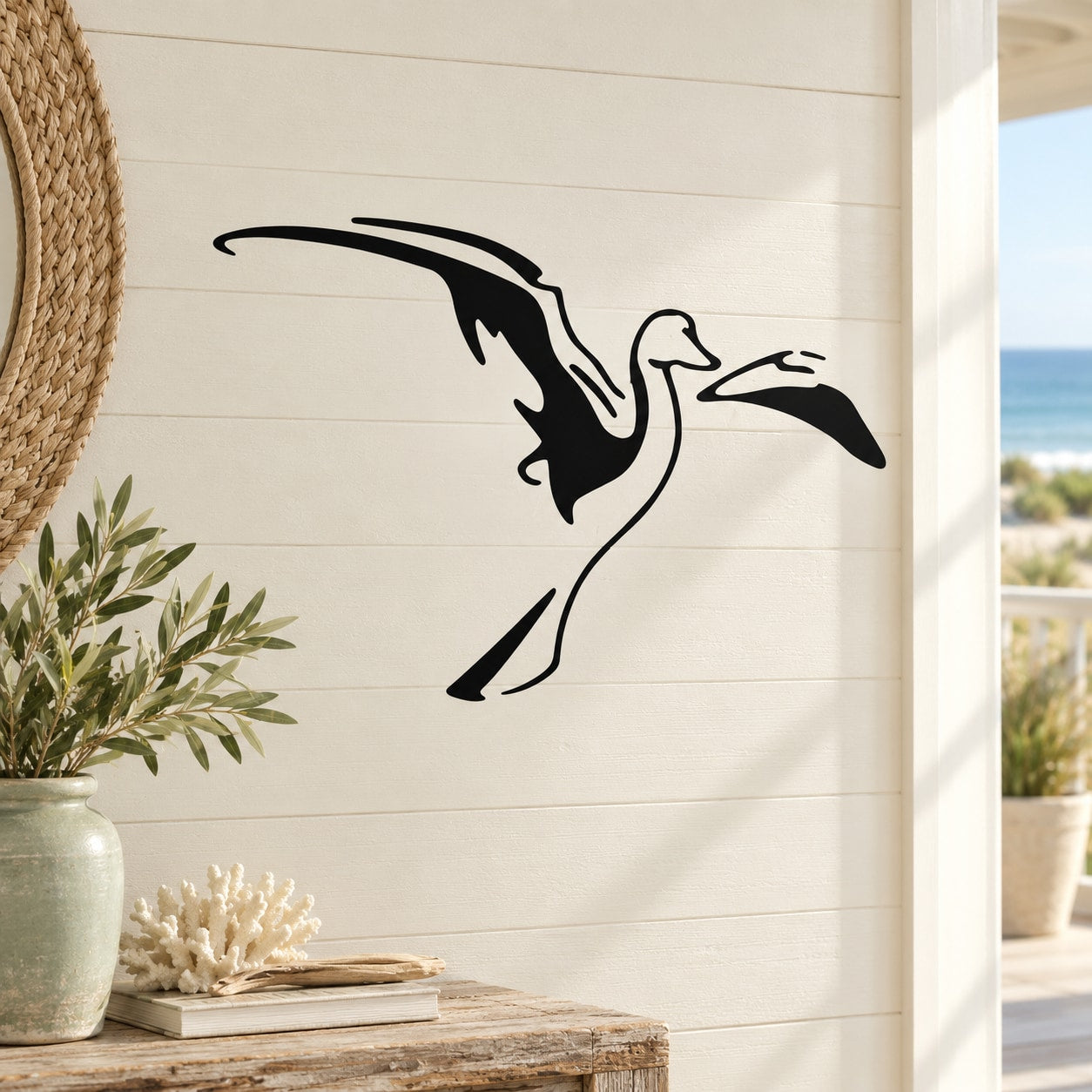 Black shore bird decal with wings spread, stretched-wing silhouette