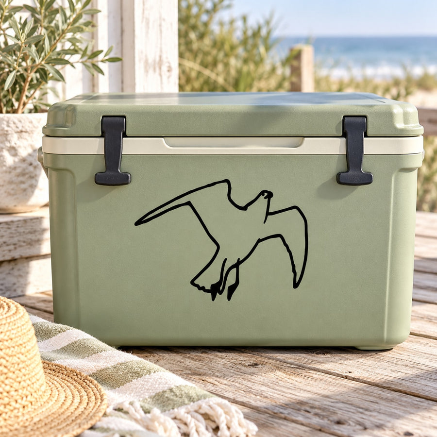 Black outline shore bird taking-flight decal on light green cooler lid