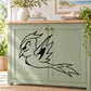 Black swallow wall decal with stylized bird wings and lightning-shaped tail