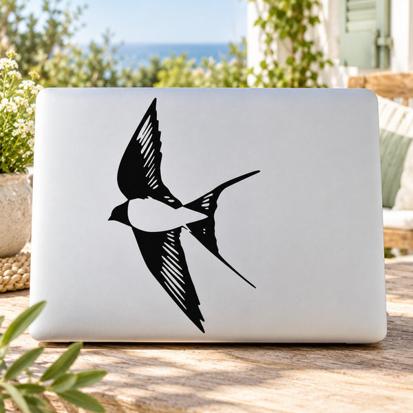 Turning Mid Flight bird decal, black silhouette on light gray rectangular backing