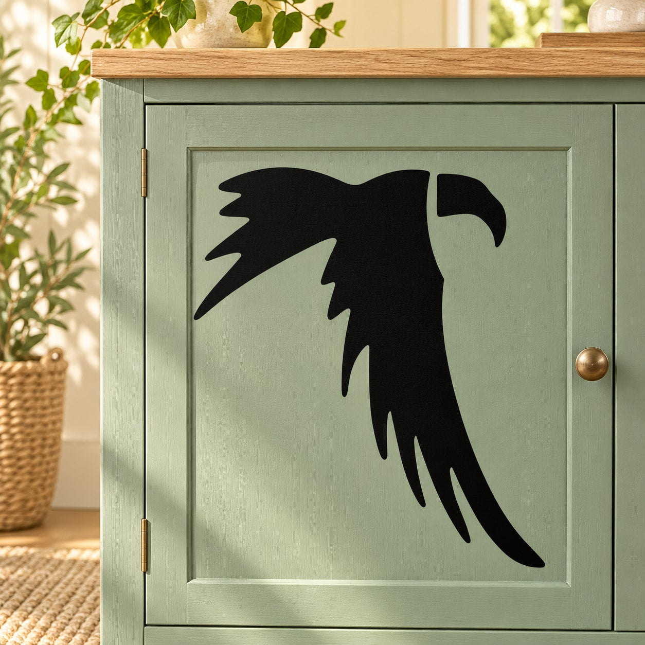 Black downward-flap falcon silhouette decal sticker
