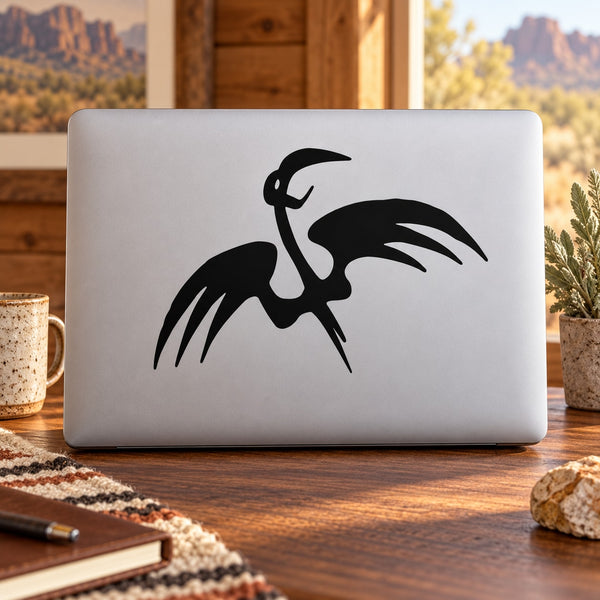 Abstract vulture decal with black silhouette on a light surface