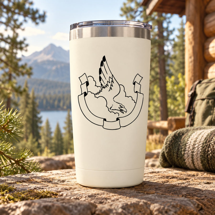 White tumbler with black eagle and banner decal