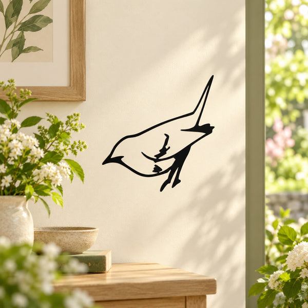 Wren bird decal with black outline silhouette on a wall