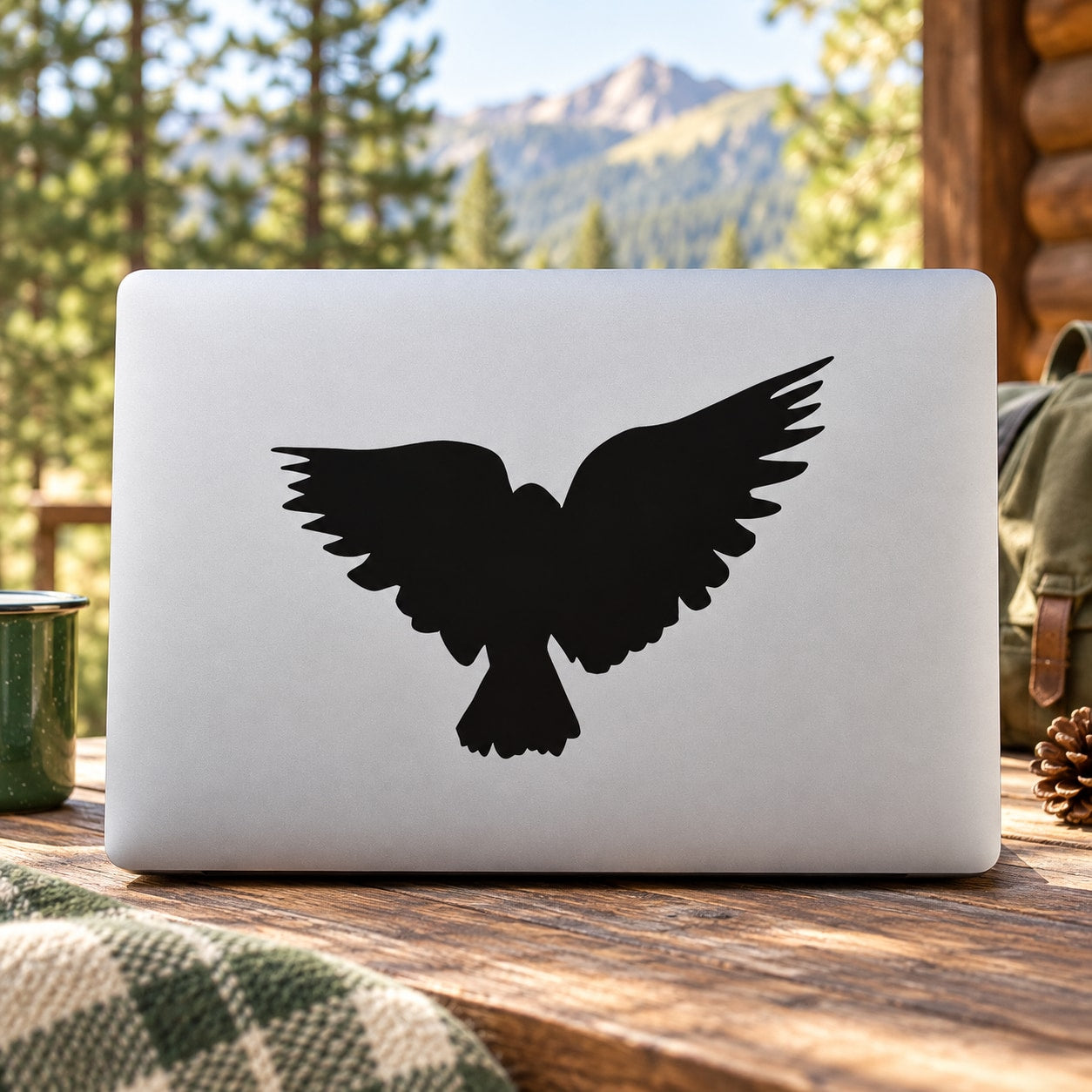 Black hawk flapping wings decal on a white backing
