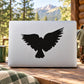 Black hawk flapping wings decal on a white backing