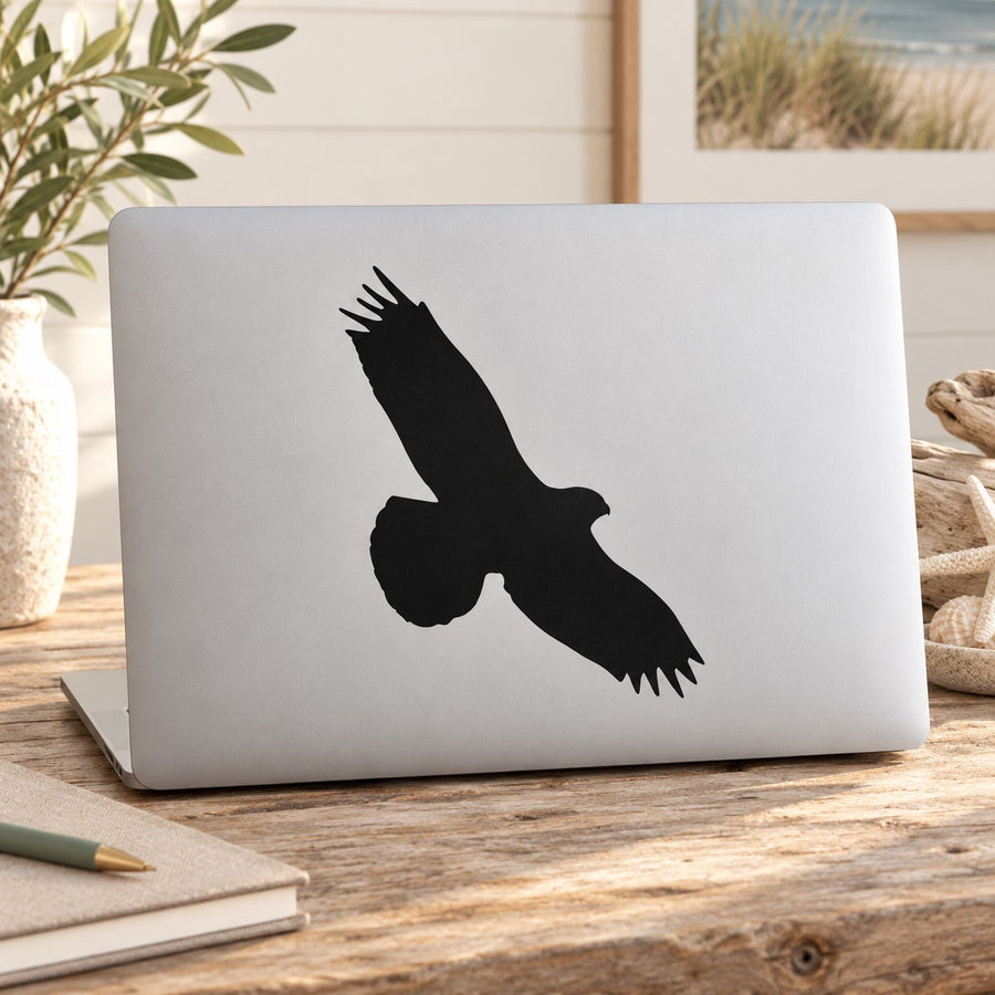 Black hawk silhouette decal for laptop or window, bold wings and sharp beak