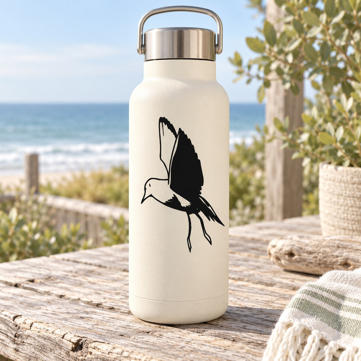 White water bottle with black shore bird decal