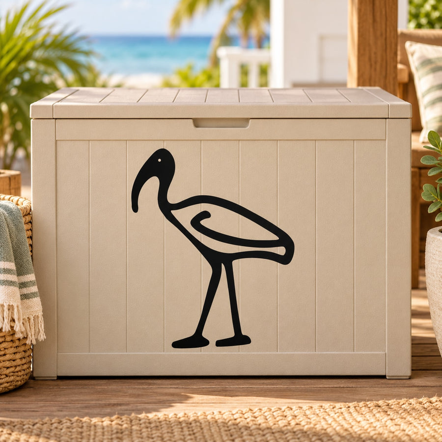 Minimal flamingo decal, black outline bird graphic on light surface