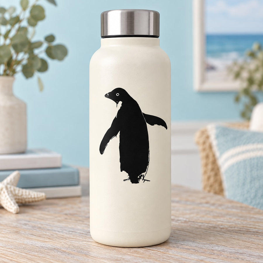 White water bottle with black waddling penguin decal