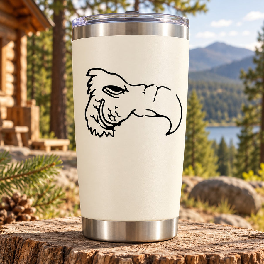Vulture head decal on white travel tumbler, black illustration on side