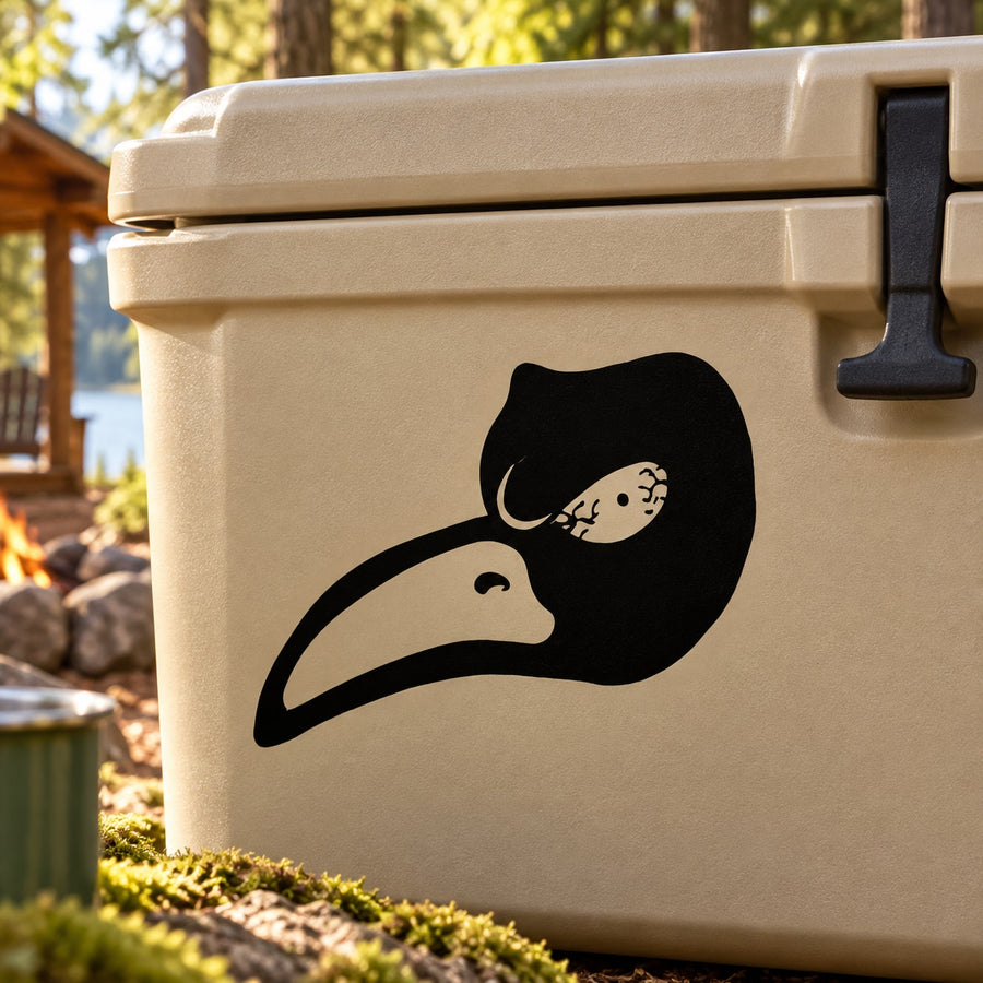 Black hawk head vinyl decal on beige outdoor storage bin
