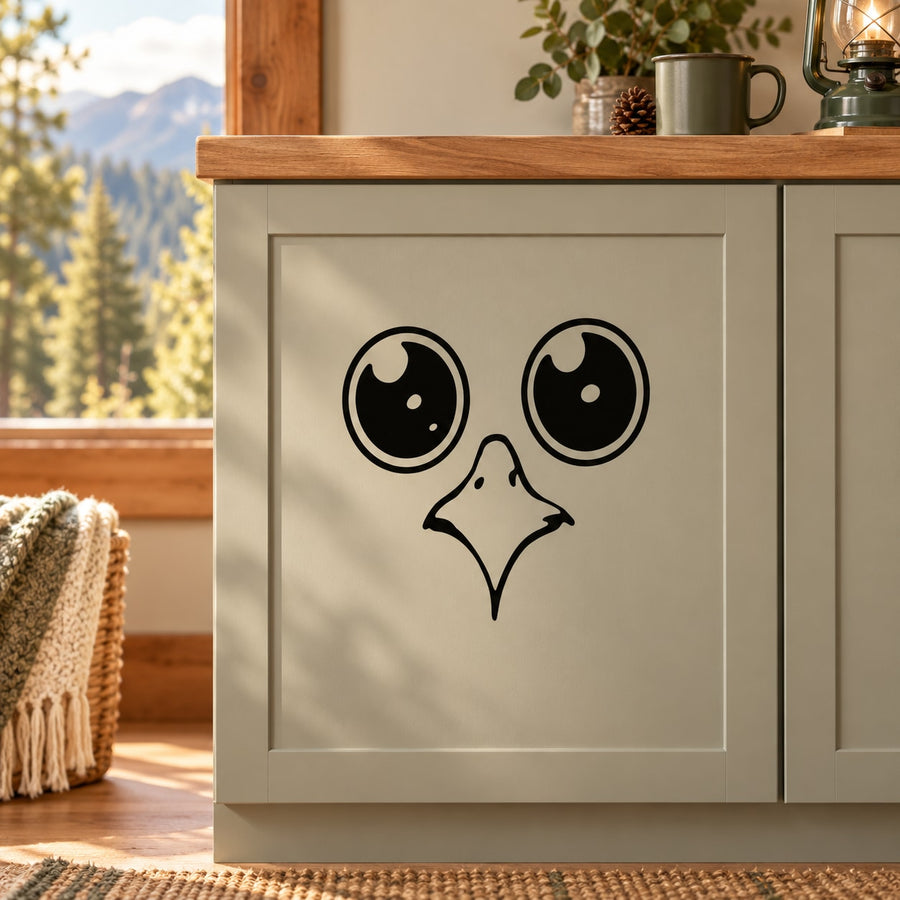 Cute eagle face wall decal, black line art with big round eyes and beak