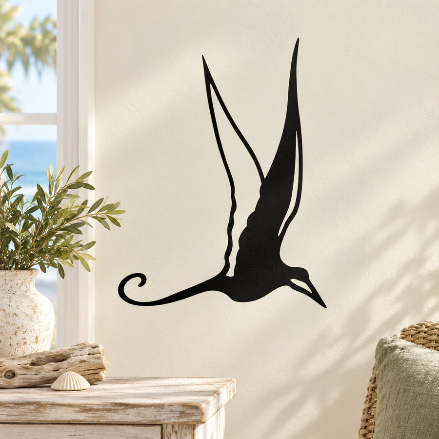 Black shore bird silhouette decal with long wings and curved tail