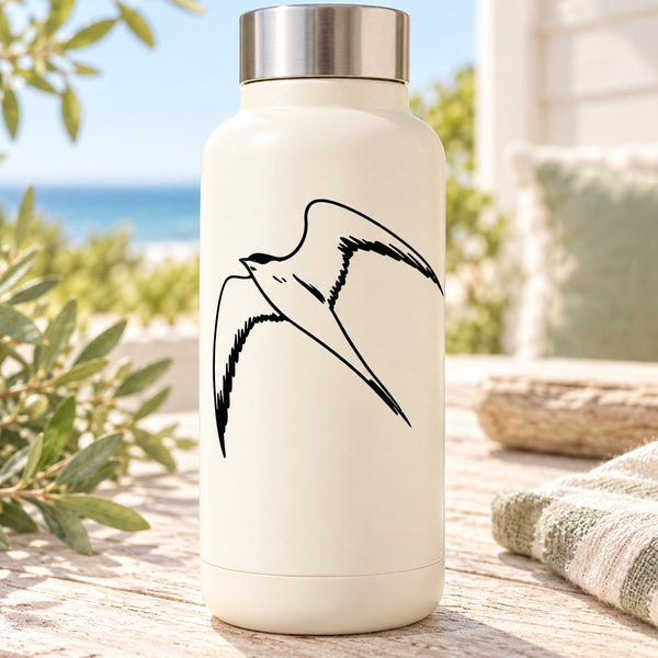 Cream bottle with black flying swallow decal