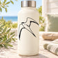 Cream bottle with black flying swallow decal