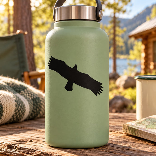 Light green water bottle with black hawk decal silhouette