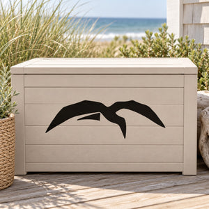 Geometric flying shore bird vinyl decal, black silhouette on light background