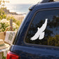 White dove silhouette decal on car rear window