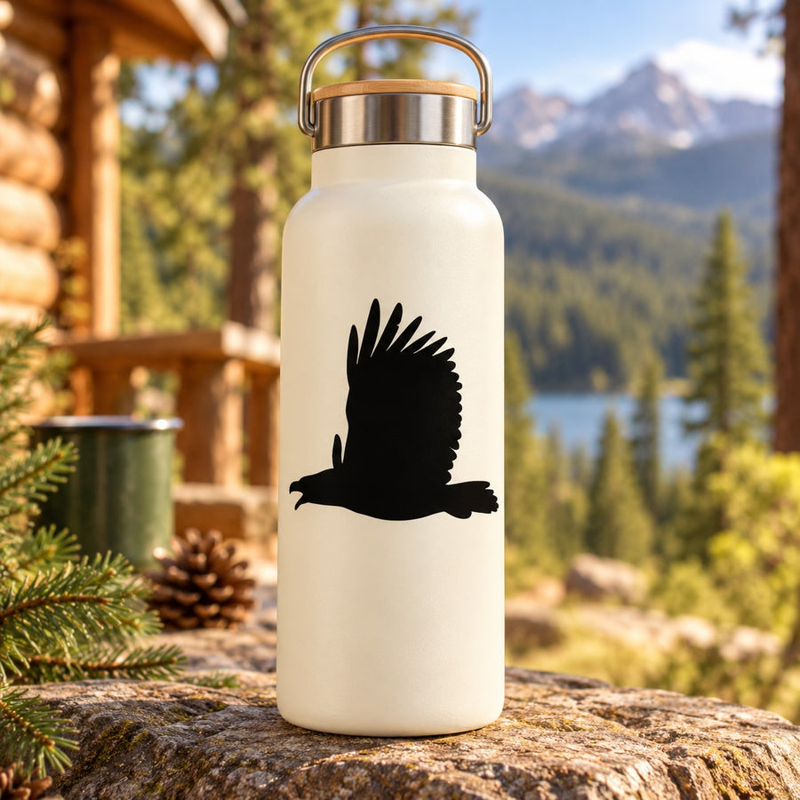 Black screaming eagle decal silhouette on a white water bottle with handle