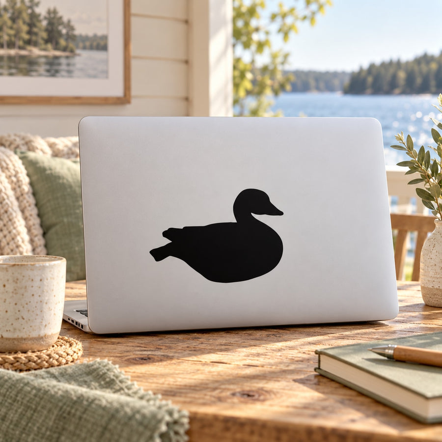 Sitting goose decal with black silhouette on light background