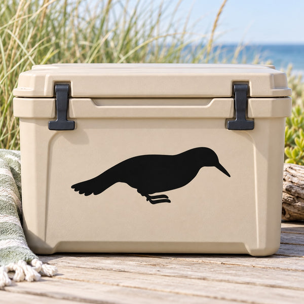Black vulture silhouette decal on a beige cooler lid