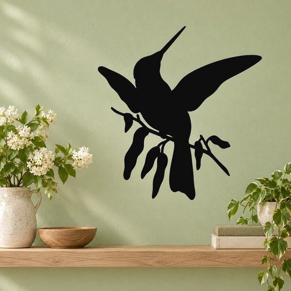 Black hummingbird decal perched on a branch with leafy accents