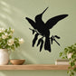 Black hummingbird decal perched on a branch with leafy accents