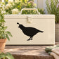 Crouching quail wall decal with black silhouette on light beige surface