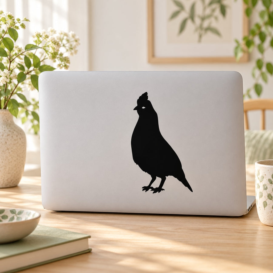 Black quail silhouette decal on white surface