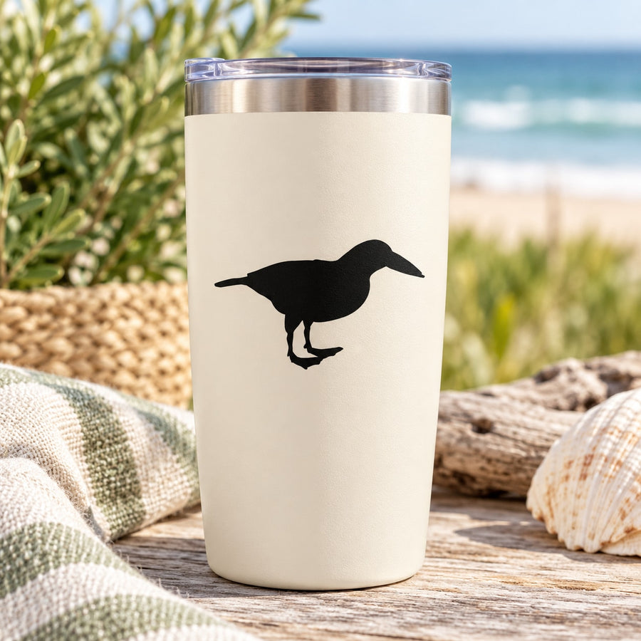 Drink tumbler with black bird silhouette decal