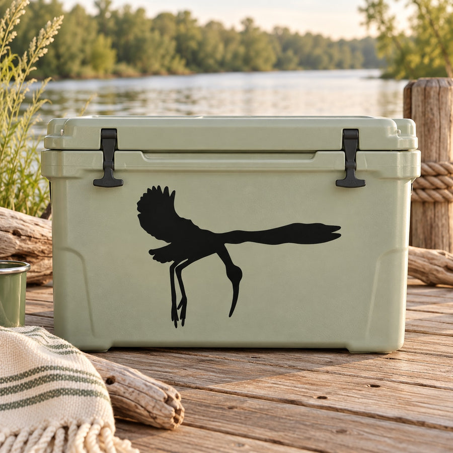 Black flying stork silhouette decal on a light-colored cooler lid