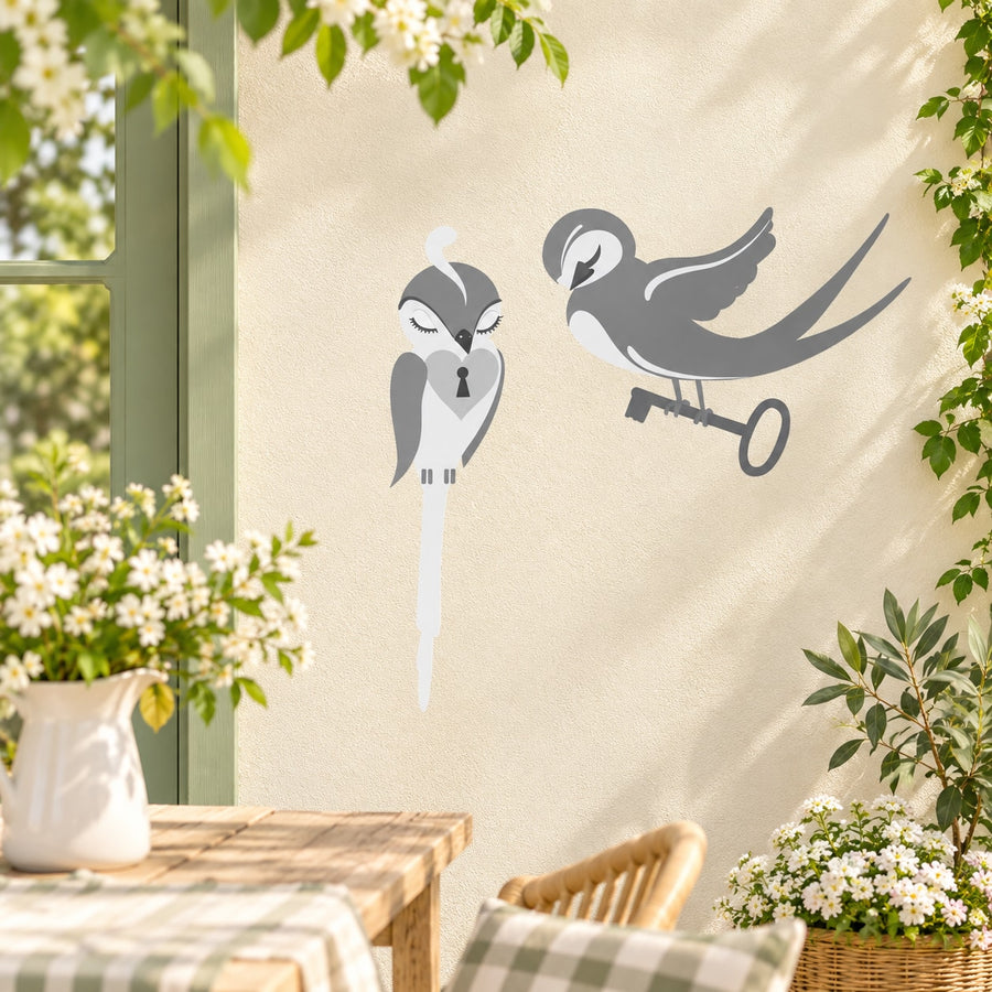 Swallow lock and key sticker with gray bird silhouettes and key details
