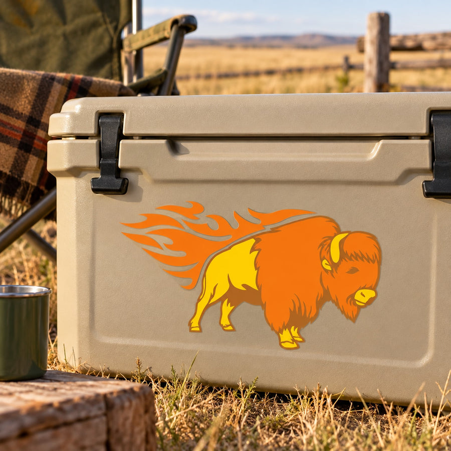 Bison graphic sticker with orange and yellow flames on a light gray cooler