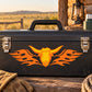 Flaming bison head sticker with orange flames on a black surface