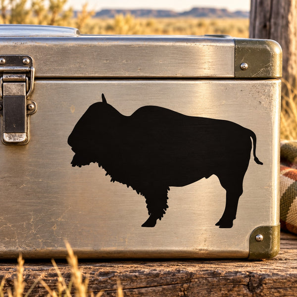 Black buffalo silhouette decal on light surface