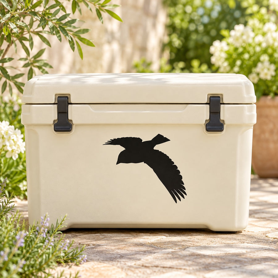 Bluebird descending decal, black bird silhouette on a white cooler surface