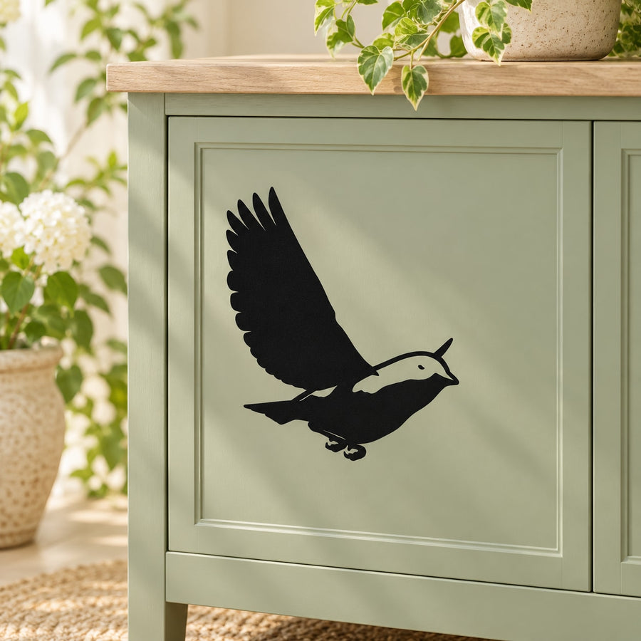 Bluebird hovering decal with black bird silhouette