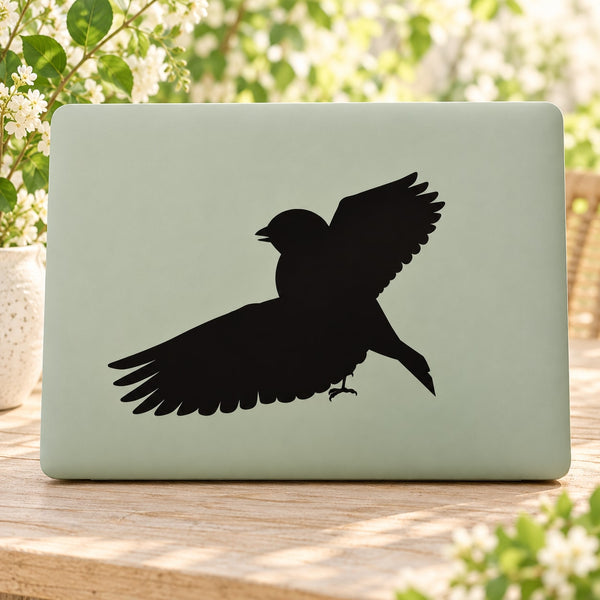 Black bird in flight silhouette decal