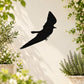 Flying blue jay wall decal with a black bird silhouette