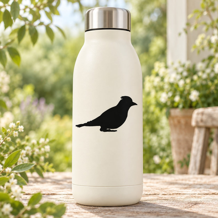 Perched blue jay decal on a white water bottle, black bird silhouette