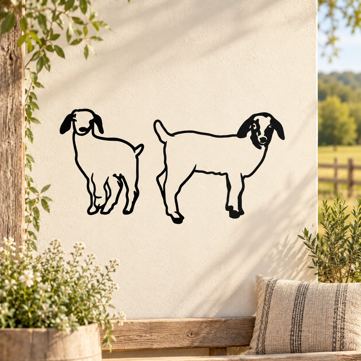 Two young goat decal silhouettes, black line art on light background