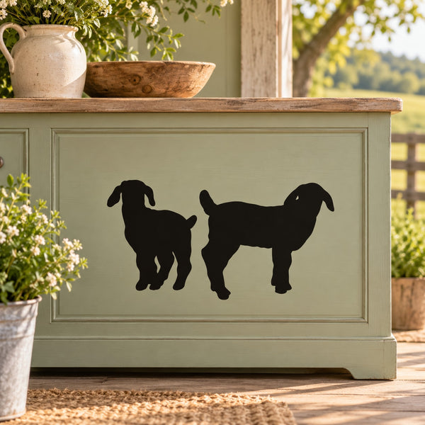Two young Boer goat silhouette wall decal, black goats on light background